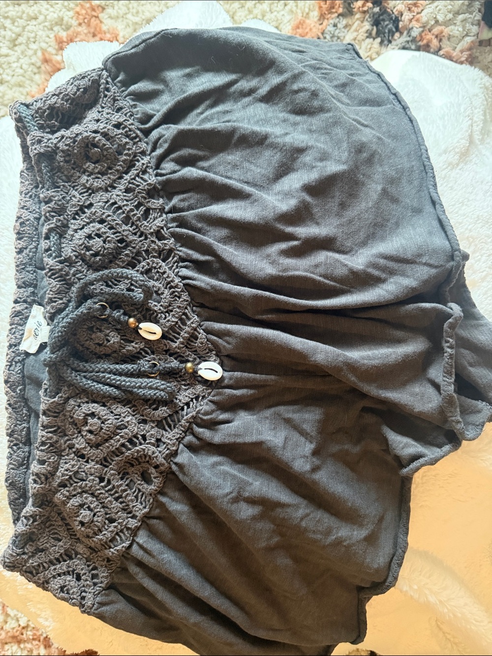 Crochet Waist Black Shorts with Shell Accent